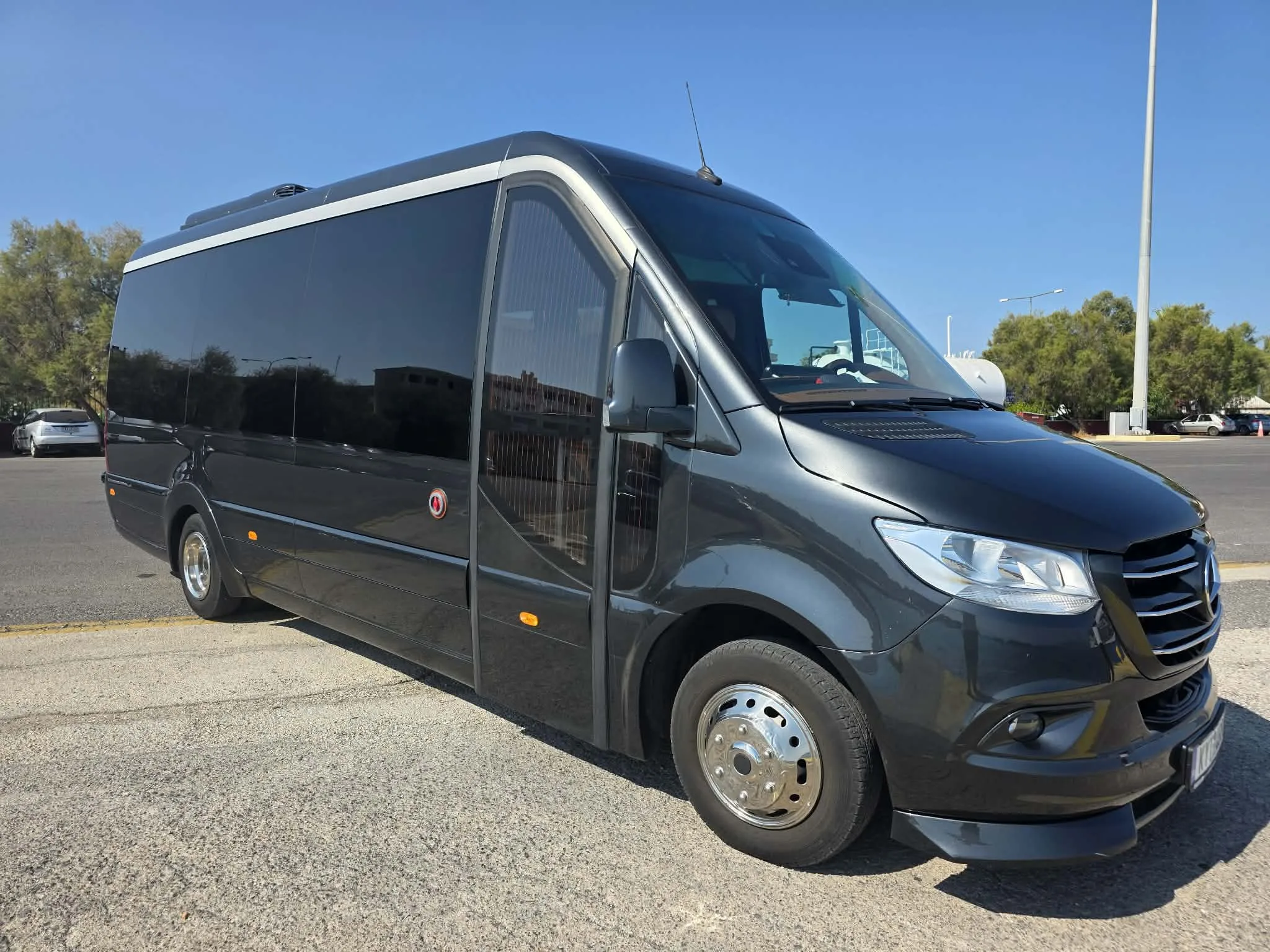 The 19-seat Mercedes Sprinter minibus seen from the side